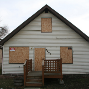 completely boarded up house